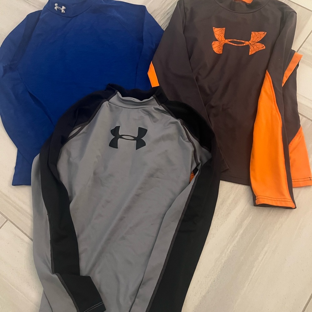 3 Under Armour Kids compression Long Sleeve Shirts - Blue, Gray, and Black